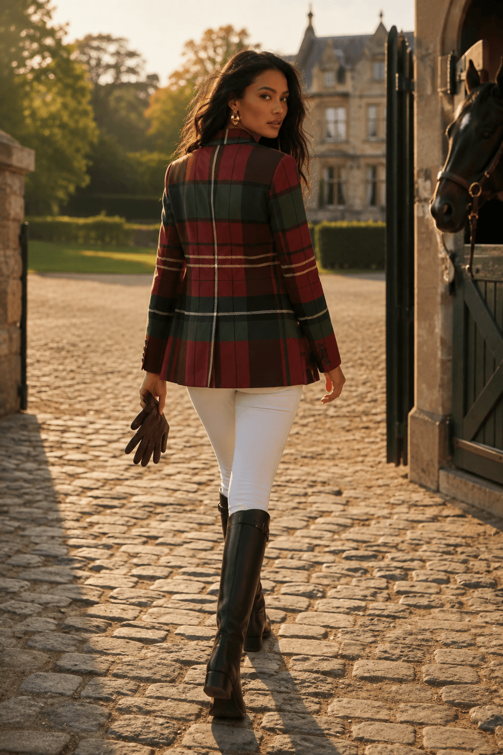 Model wearing an organic design tartan blazer with a stack of vintage books, showcasing dark academia outfit ideas 2026.