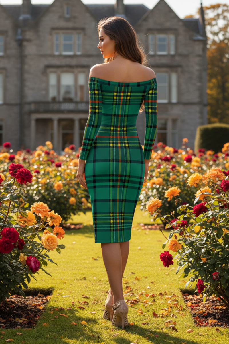 Woman wearing Dunnotar Tartan off shoulder dress in green standing in a garden with flowers and historic building backdrop
