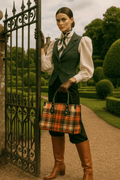 Woman holding a heritage style women's handbag with orange plaid pattern by Angelic Blessings Shop