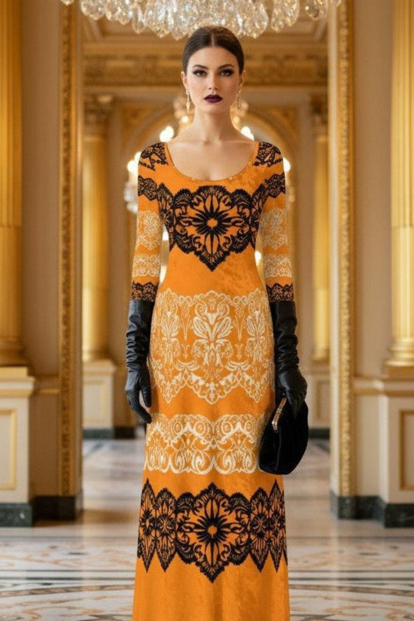 Luxury gold velvet evening gown with black lace details worn by model in grand chandelier hall