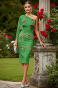 Green one-shoulder evening dress with floral embroidery worn by model in garden setting