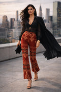 High waist statement pants creating an elongated, confident silhouette for women.