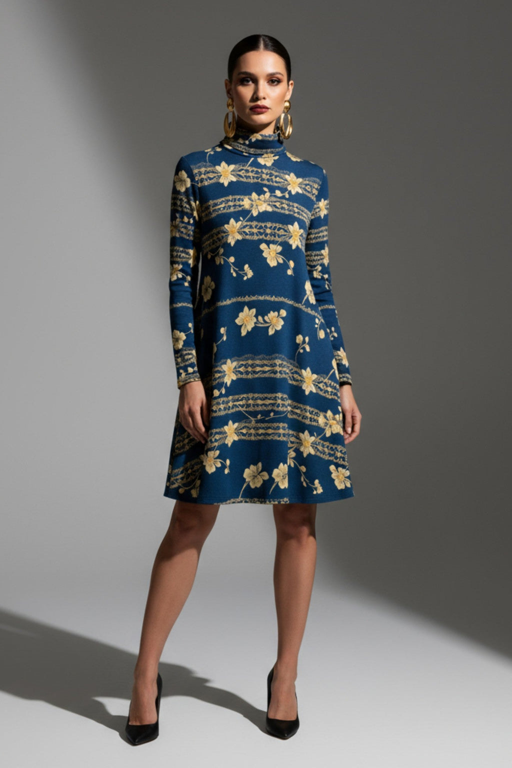 Navy blue floral high neck dress with long sleeves from Angelic Blessings Shop worn by model